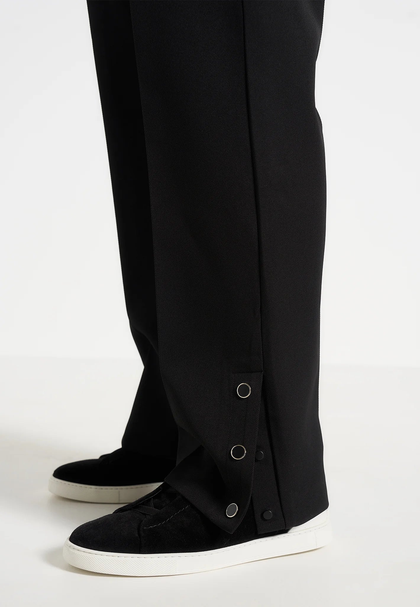 Black Button Cuff Relaxed Fit Tailored Trouser by Emporeo