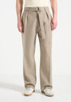 Beige Relaxed Fit Belted Tailored Trousers By Emporeo