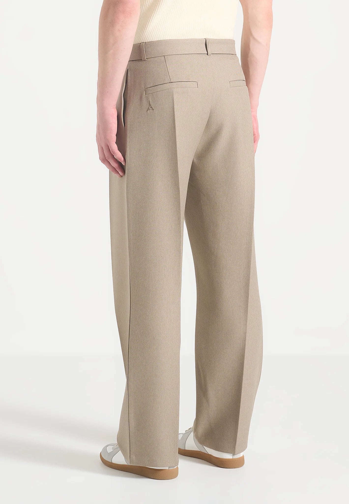 Beige Relaxed Fit Belted Tailored Trousers By Emporeo