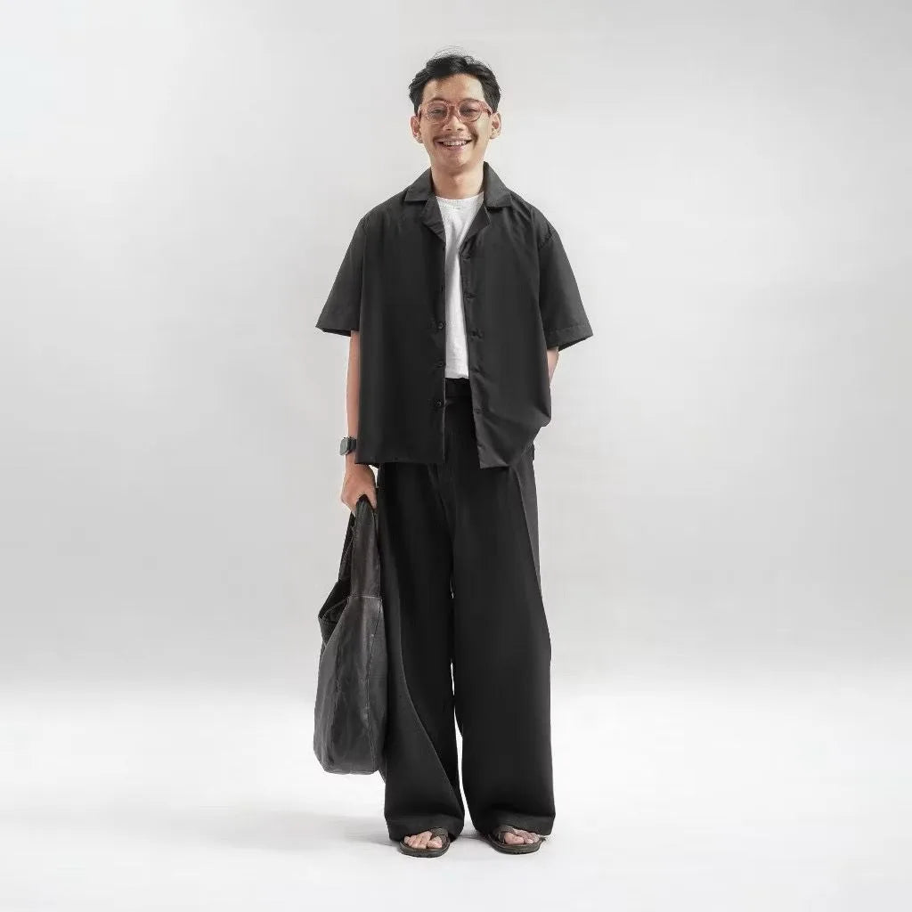 Black Drape Pleated Baggy Tailored Trouser by Emporeo