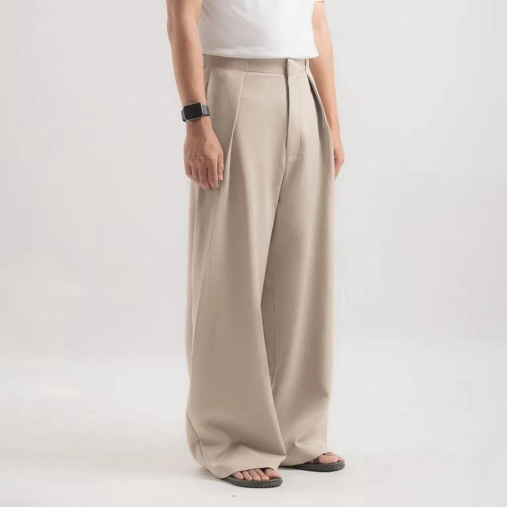 Beige Drape Pleated Baggy Tailored Trouser by Emporeo