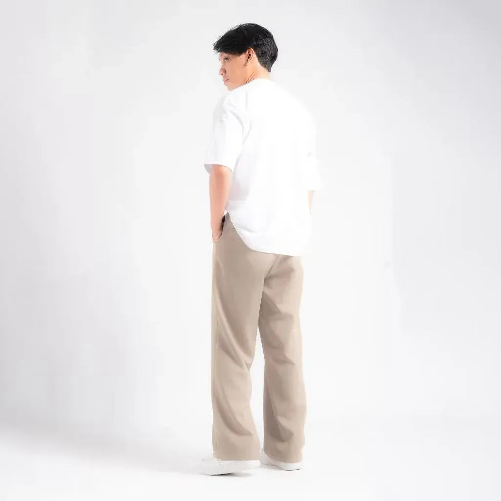 Beige Elite Belted Baggy Tailored Trouser by Emporeo