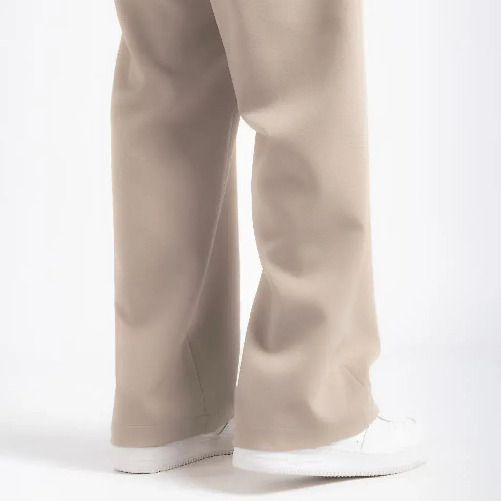 Beige Elite Belted Baggy Tailored Trouser by Emporeo